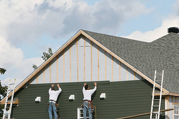 Professional Vinyl Siding technician working in Olin, NC
